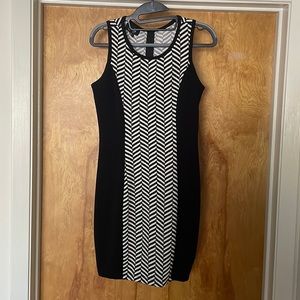 Flattering fitted dress: go straight to dinner or event from work in this number